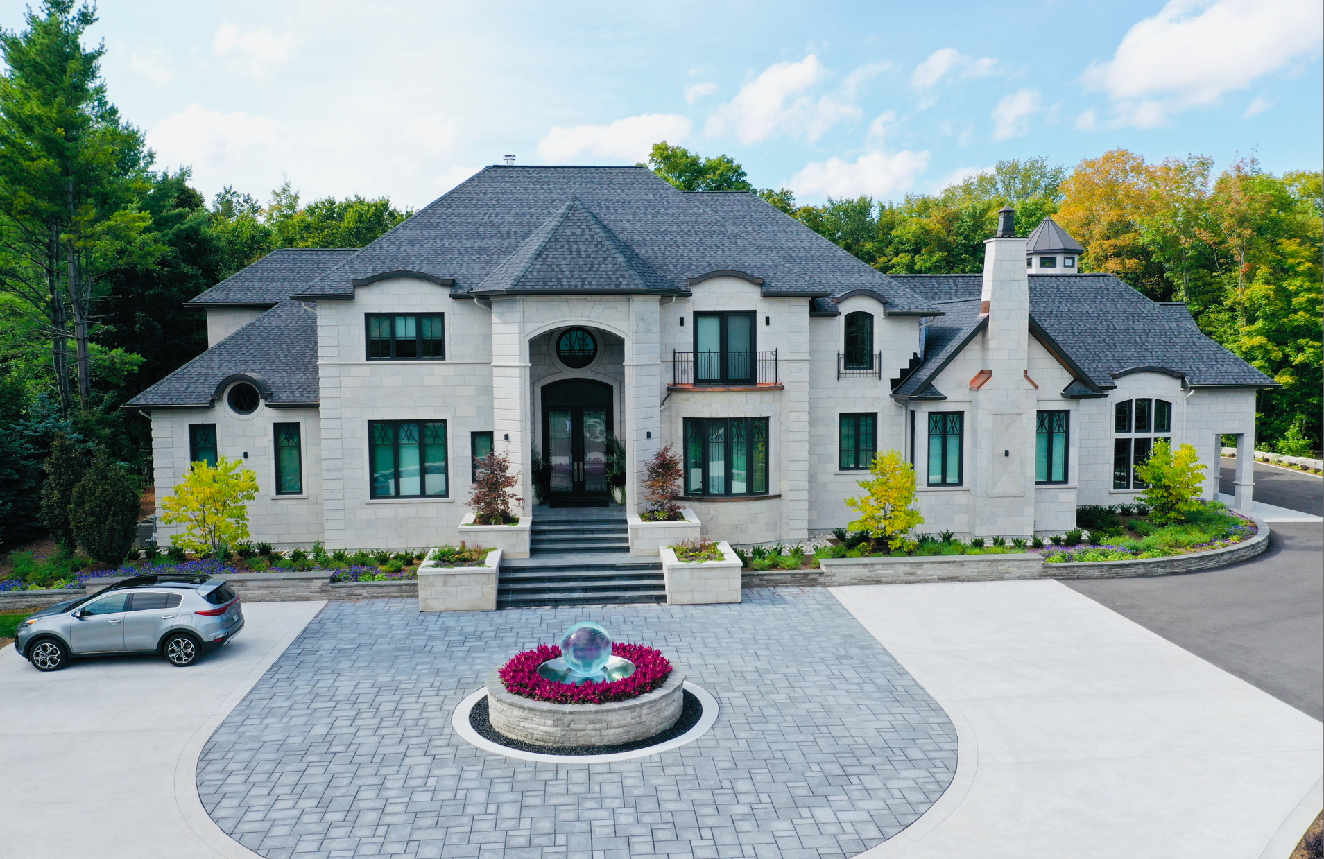 Aqualens Elegance: A Sphere Fountain That Welcomes You Home