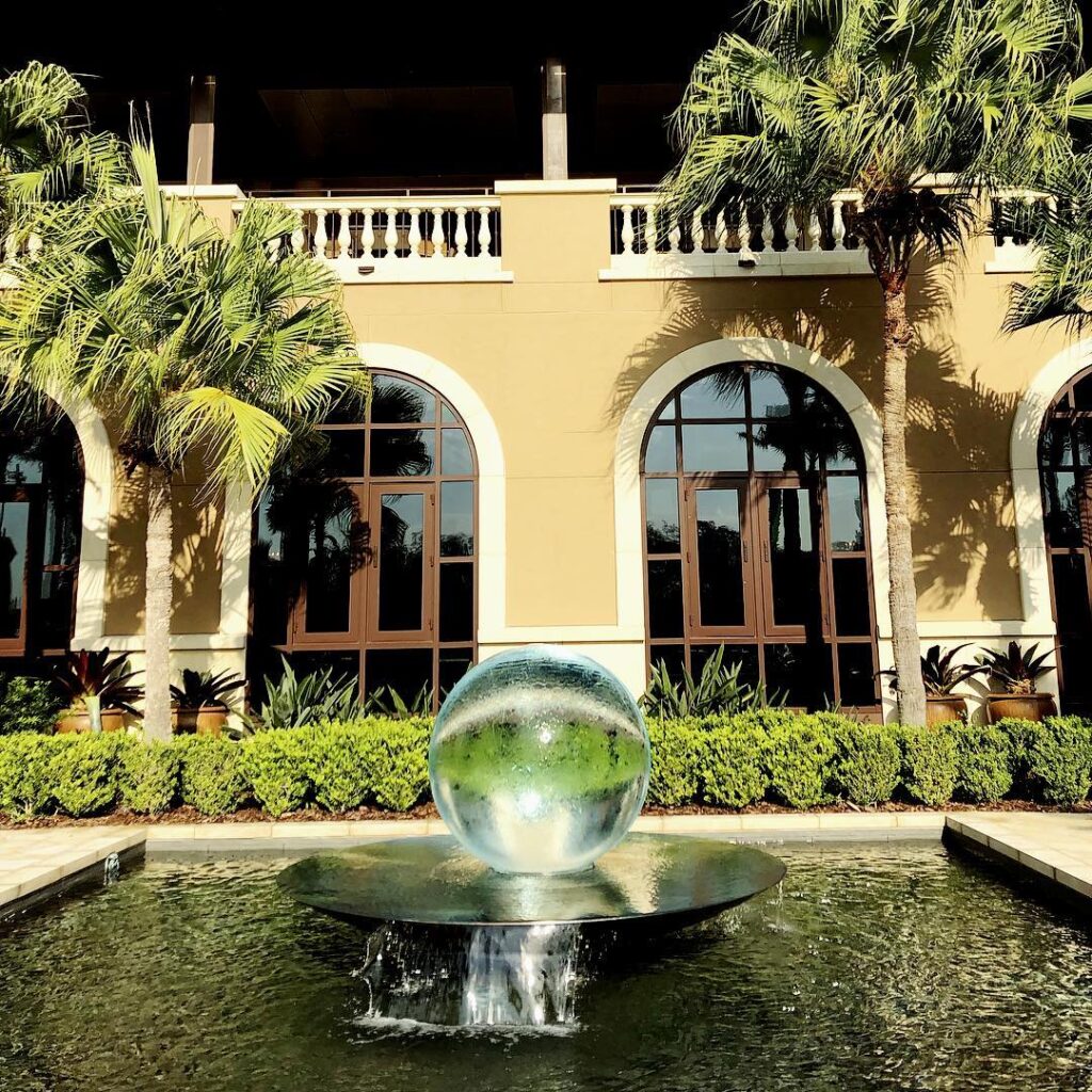 fountain and palms